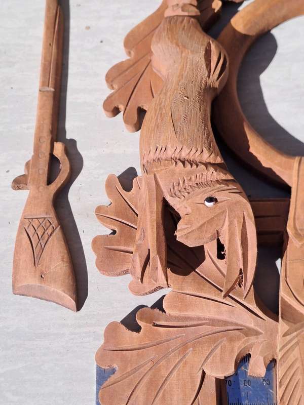 Cuckoo  housing surround with hare and bird and rifle