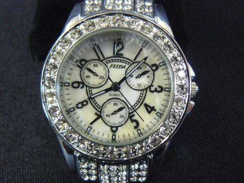 STUNNING WHITE RIHNSTONE WATCH with mother of pearl face