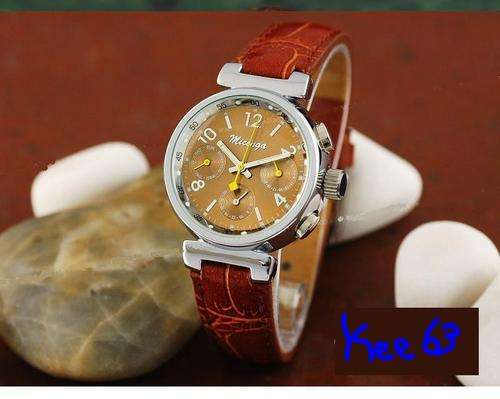 VERY ELEGANT LADIES AUTOMATIC BRONZE FACED WATCH WITH LEATHER STRAP