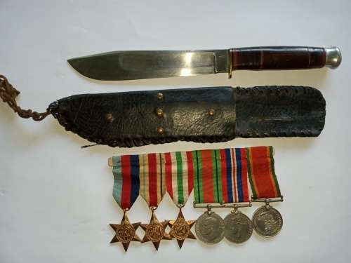 WORLD WAR TWO SOUTH AFRICAN MEDALS GROUP AND FIGHTING KNIFE
