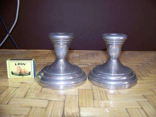 TWO SILVER CANDLE HOLDERS