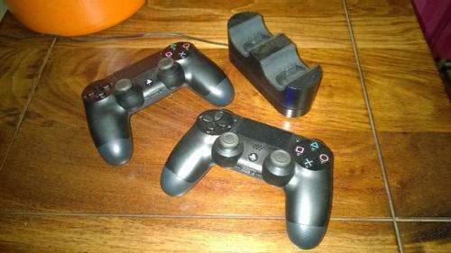 PlayStation 4 Bundle PS4 console, 2 controls, charging dock, PS4 camera, 4 games, 90 days PS+ access