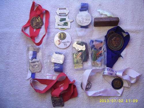 15 old running medals on auction. You are bidding per medal to take all. Shipping will be R 45.00