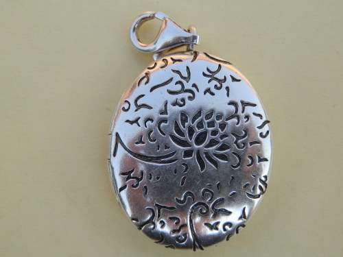 Sterling silver locket - thirty (30) days to pay