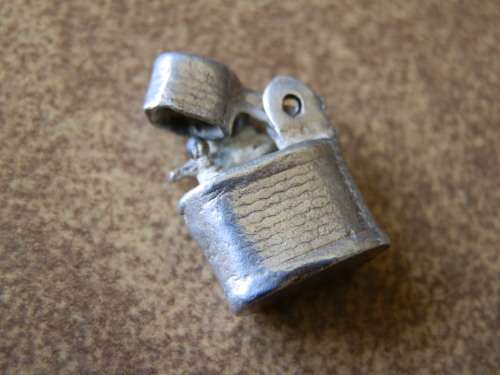Sterling silver (5.2g) lighter charm - thirty (30) days to pay