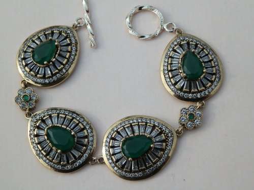Heavy (39.1 g) sterling silver emerald and topaz bracelet
