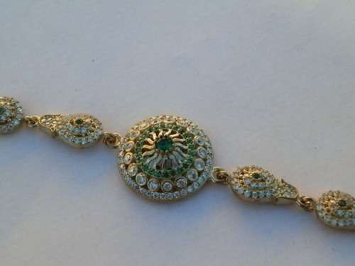 Sterling silver emerald and topaz bracelet, 20 g.