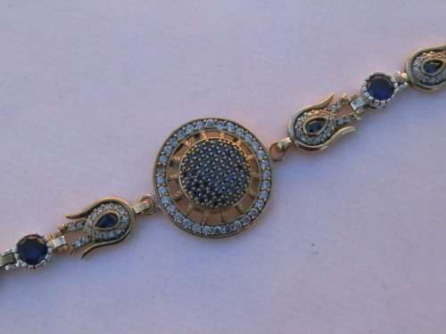 Sterling silver blue sapphire and topaz bracelet, 20 g.