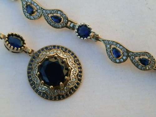 Sterling silver sapphire pendant and bracelet combo, 20.5 g.
