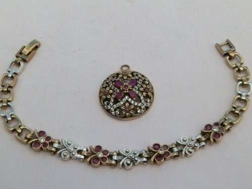 Sterling silver ruby bracelet and pendant combo, 25.2 g.