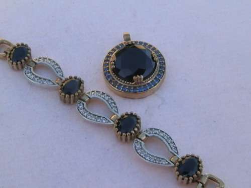Sterling silver sapphire bracelet and pendant combo, 9.3 g.
