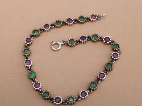 Sterling silver ruby and emerald bracelet, 7.6 g.