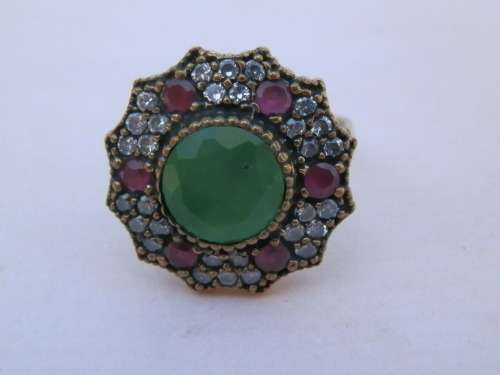 Sterling silver emerald and ruby ring, 7.8 g.