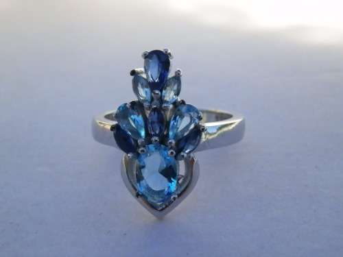 Gorgeous sterling silver ring with lovely blue stones - weight 4.9 g.  Thirty (30) days to pay.