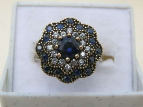 Fabulous sterling silver sapphire cluster ring - weight 4 g.  Thirty (30) days to pay