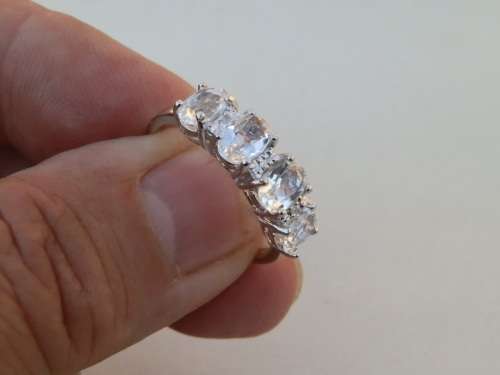 Sparkling SOLID sterling silver topaz and diamond ring - weight 2.9 g.  Thirty (30) days to pay