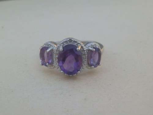 Elegant SOLID sterling silver amethyst and diamond ring - weight 3.2 g.  Thirty (30) days to pay