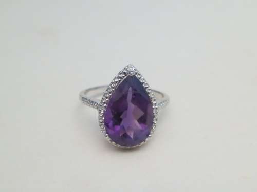 Elegant SOLID sterling silver amethyst and diamond ring - weight 3.7 g.  Thirty (30) days to pay