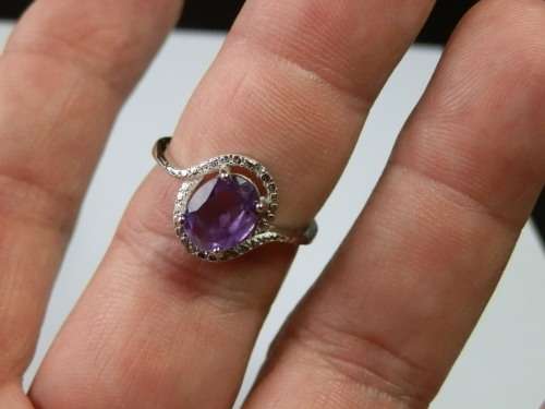 Smashing sterling silver 1.60 ct amethyst and diamond ring - weight 2.7 g.  Thirty (30) days to pay