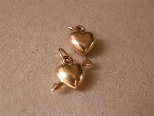 Two lovely 9 ct gold "heart" charms