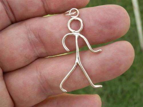 LATE ENTRY!!  Charming solid 9 ct gold "The Saint" pendant - weight 1.9 g.