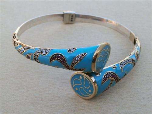Ravishing sterling silver ruby and turquoise bracelet - weight 24.46 g.