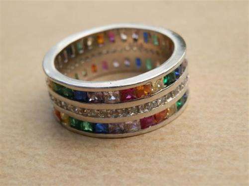 Marvelous solid sterling silver ruby, sapphire, amethyst, emerald and topaz ring - weight 6.77 g.