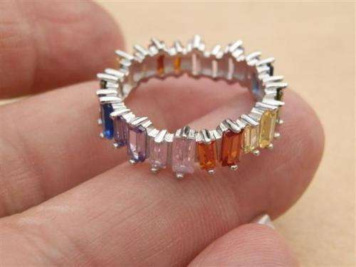 Spectacular solid sterling silverblue sapphire, amethyst and topaz ring - weight 4.26 g.