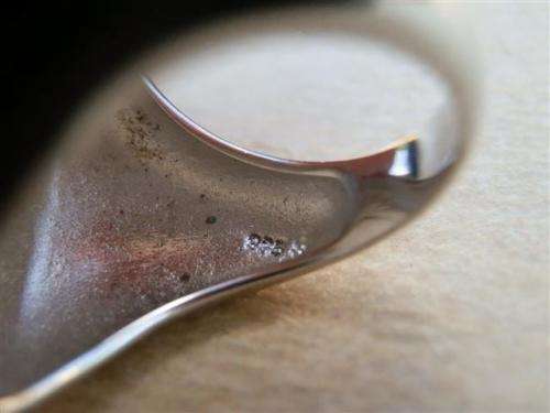 Spectacular heavy solid sterling silver topaz ring with white oval stone - weight 14.32 g.
