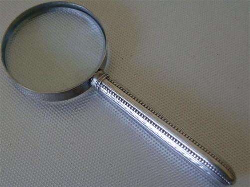 Very nice vintage solid silver magnifying glass, hallmarked.