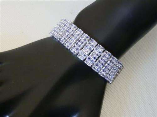 Exquisite 14 ct white gold over solid sterling silver bracelet with 298 natural Tanzanites, 54 g