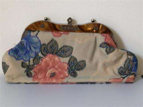 Antique handbag with floral motif and bead work