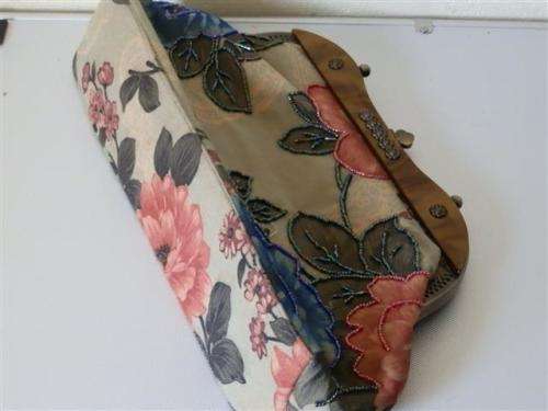 Antique handbag with floral motif and bead work