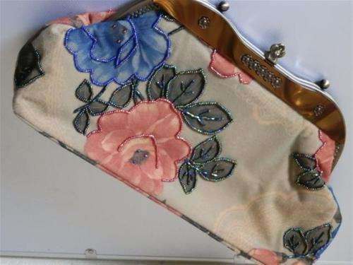 Antique handbag with floral motif and bead work
