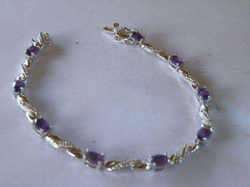 Sterling silver tennis bracelet with amethyst and diamond (Valuation certificate included)
