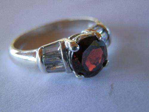 Sterling silver garnet ring - shipping R35 insured