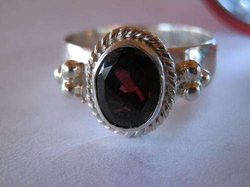 Sterling silver garnet ring - shipping R40 insured