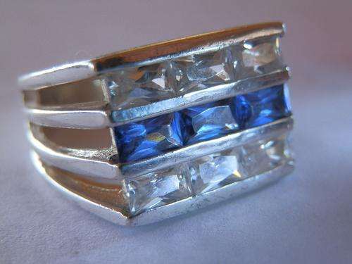 Sterling silver blue and white topaz ring - shipping R40 insured
