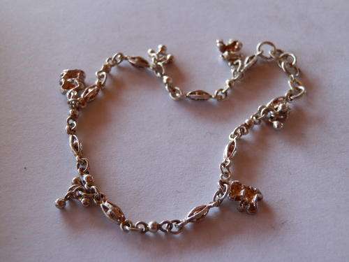 Fancy sterling silver charm bracelet - shipping R40 insured