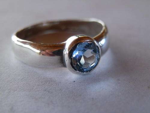 Sterling silver blue topaz ring - shipping R40 insured