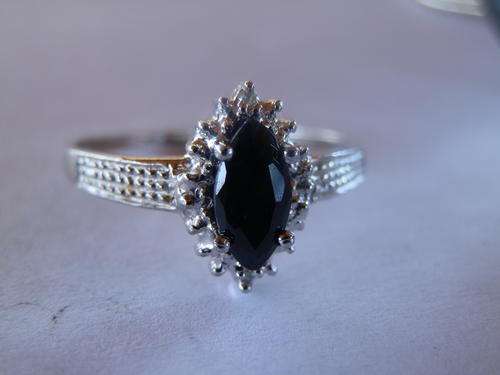 Sterling silver blue sapphire and diamond ring - shipping R40 insured
