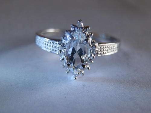 Sterling silver aquamarine and diamond ring - shipping R40 insured