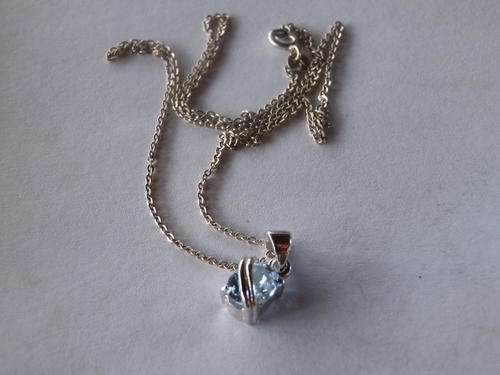 Sterling silver blue topaz pendant and chain - shipping R40 insured