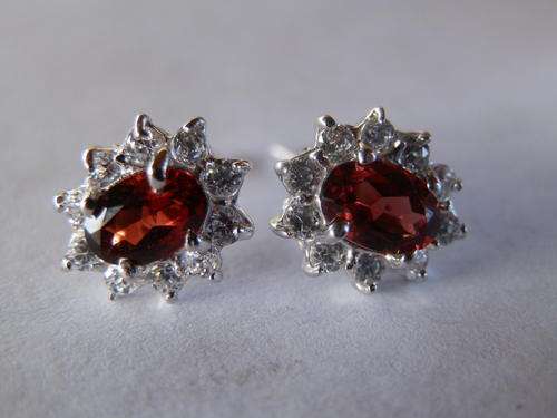 Sterling silver garnet and topaz earring - shipping R40 insured