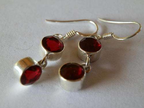 Sterling silver garnet earring - two (2) weeks to pay