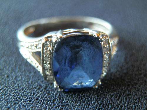 9ct White gold - 3.3 gram - blue stone and diamond ring (Value R6,920) - two (2) weeks to pay