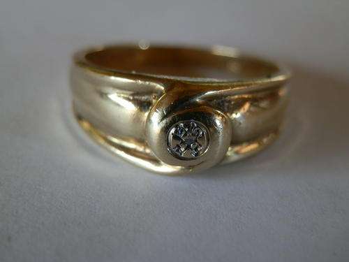 9 ct Gold (3.4 gram) diamond. ring - thirty (30) days to pay. Value R4,230
