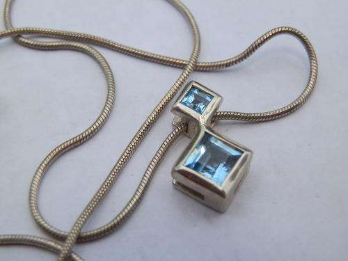 ANNUAL CLEARANCE!! Sterling silver blue topaz pendant and chain
