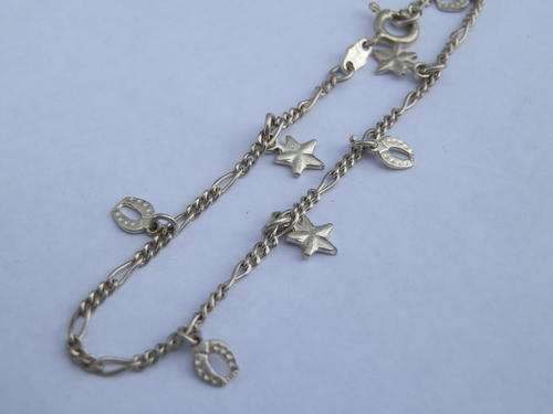 Sterling silver charm bracelet - thirty (30) days to pay