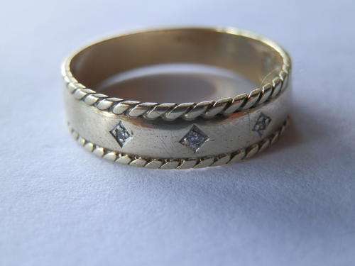 9 ct Gold (2.3 gram) diamond ring - thirty (30) days to pay. Value R3,230